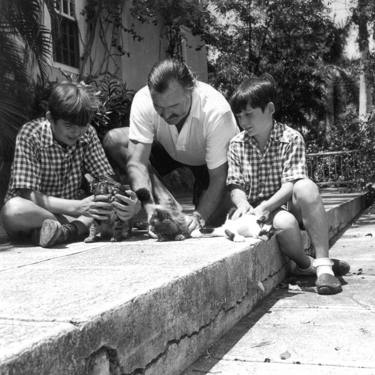 EH 2871P  November 1946  Ernest Hemingway and sons Patrick (left) and Gregory, with cats Good Will, Princessa, and Boise. Finca Vigia (Hemingway home), San Francisco de Paula, Cuba. Photograph in the Ernest Hemingway Photograph Collection, John F. Kennedy Presidential Library and Museum, Boston.